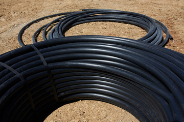 Black hose for watering network to gardens.