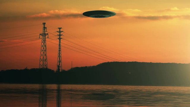 UFO Space Ship near the High Voltage Electricity Pylons at Sunset