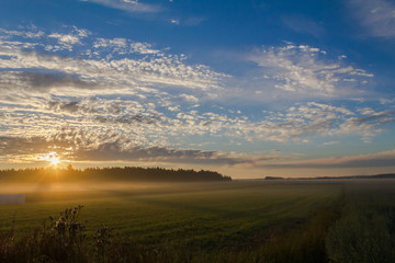 Fototapeta na wymiar Sunrise in Finnish countryside