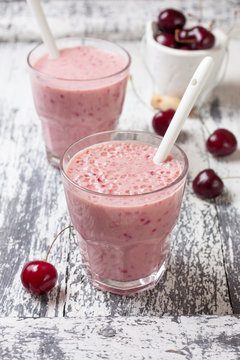 smoothie with cherry in a glass