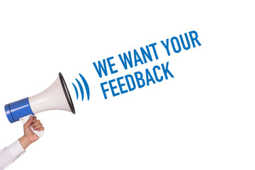 Hand Holding Megaphone with WE WANT YOUR FEEDBACK Announcement