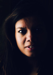 Moody portrait of asian woman