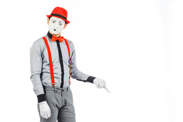 Portrait of a man, artist,clown, MIME. Shows something, isolated on white background