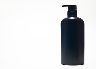 Black plastic bottle White background. Flask. Isolated.
