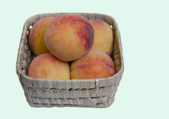 Peach fruit in a basket