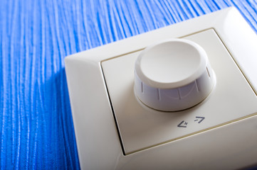 Dimir switch for smooth light switch on the wall