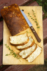 Homemade cake with goat cheese and oregano