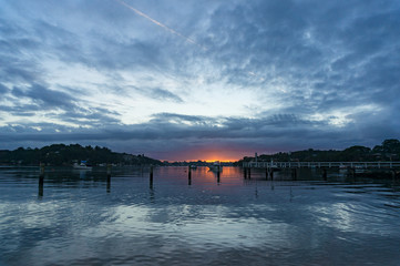 Naklejka premium Sunset, sunrise landscape with yachts on tropical lagoon