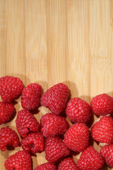 Raspberry on Cutting Board
