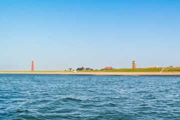 Lighthouse at North Sea coast, Huisduinen, Den Helder, Netherlan