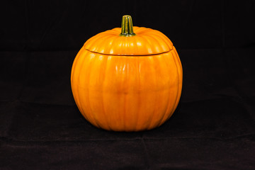 pumpkin shaped candy dish (six inches high, five and a half wide)