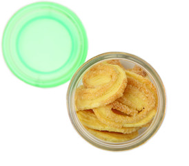 Biscuits on white plate against white background