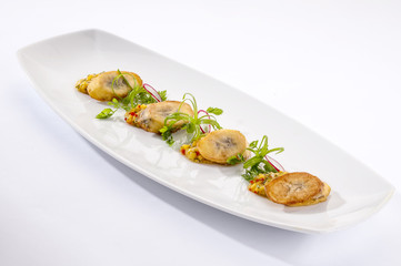 Banana canapes with spicy cornmeal 