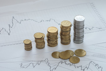 Forex charts and dollar coins