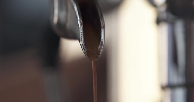 preparing espresso with professional coffee machine closeup shot, 4k prores footage