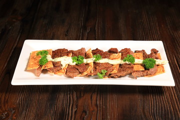 Meat dish. Assorted barbecue.