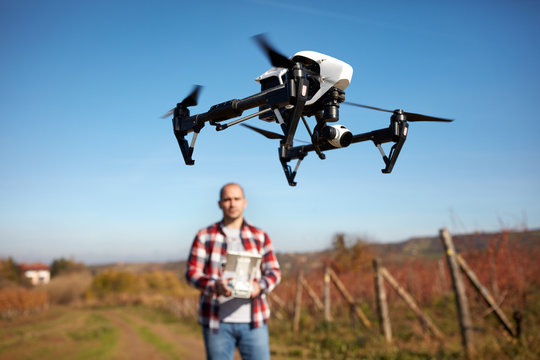 Drone hovering over vineyard