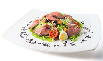 meat salad with roast beef, mushrooms, vegetables and cheese on white background, isolated