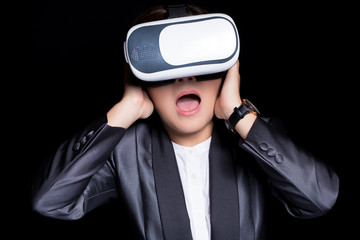 Asian woman wearing VR technology with business suit
