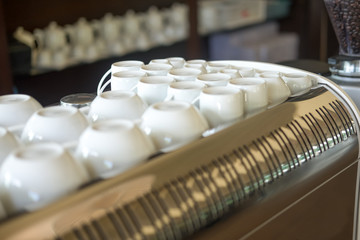 Many empty white cups