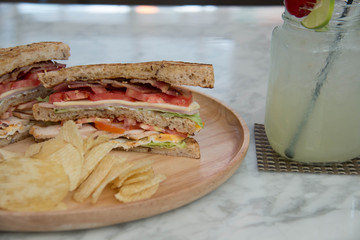  sandwich closeup with  tomatoes chip potato