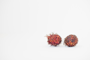 Exotic fruit rambutan (Nephelium lappaceum) isolated on white background. Healthy eating dieting food.