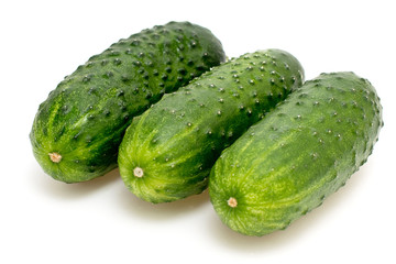 Three cucumber on a white