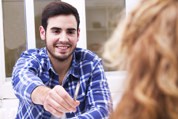 contract and signing with the woman in the office