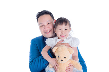 Asian father holding his daughter over white background