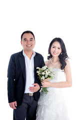 Asian bride and groom isolated over white background