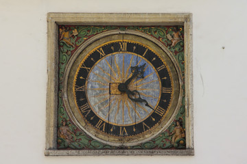 Fototapeta na wymiar Ancient outdoor clock in Tallinn