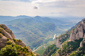 Fototapeta na wymiar Landscape of a mountain valley from the monastery of Montserrat. Catalonia, Spain.