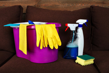 Cleaning servisce supplies in a busket, closeup