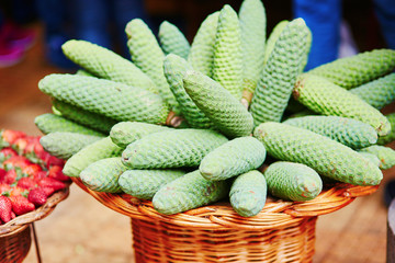 Delicious, ripe exotic fruit of monstera deliciosa on traditional farmer market in Funchal