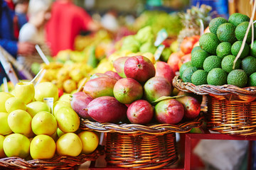 Fresh and ripe exotic fruits on traditional farmer market on Madeira