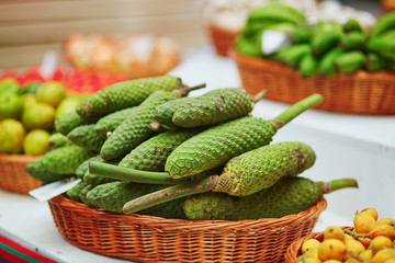 Delicious, ripe exotic fruit of monstera deliciosa on traditional farmer market in Funchal