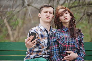 Young couple doing selfie