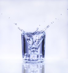 ice cube into a glass of water