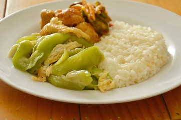 stir fried gourd with egg and spicy fish ball on rice