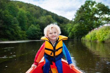 Little boy in kayak
