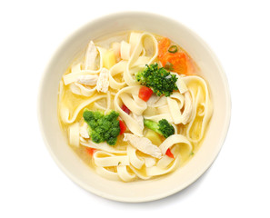Chicken noodle soup in bowl on white background