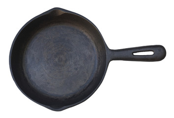 Seasoned iron frying pan. Isolated.