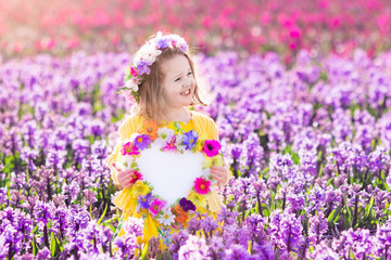 Little girl in hyacinth field