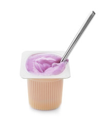 Plastic cup with yogurt and spoon on white background