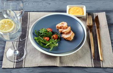 Portion of delicious chicken cordon bleu on plate