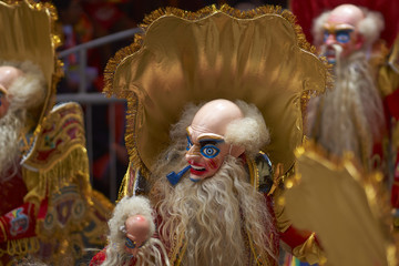 Morenada dancer in ornate costume parading through the mining city of Oruro on the Altiplano of Bolivia during the annual carnival.