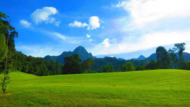 Beautiful golf course on the tropical Langkawi islands of Malaysia, with Mountains in the background