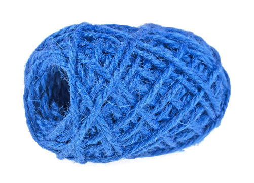 Tangle of blue thread on white background