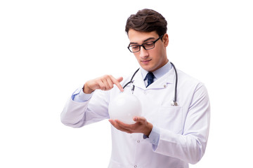 Doctor with crystal ball isolated on white background