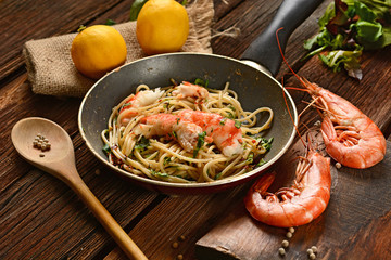 spaghetti with shrimps and assorted herbs - Italian food